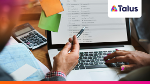 A professional reviews an overflowing email inbox on a laptop as part of an email first resourcing workflow.